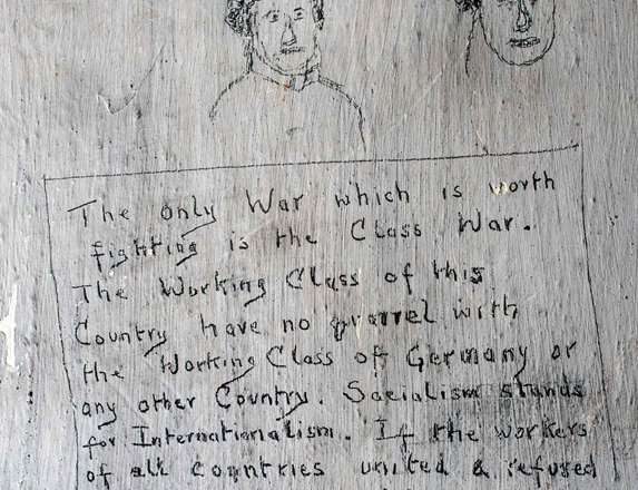 Graffiti from imprisioned First World War conscientious objector held in the cell block at Richmond Castle.