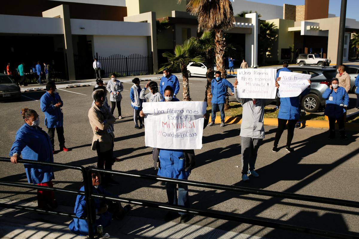 Workers respond to the coronavirus pandemic